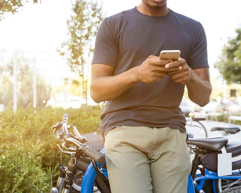 texting man bicycle